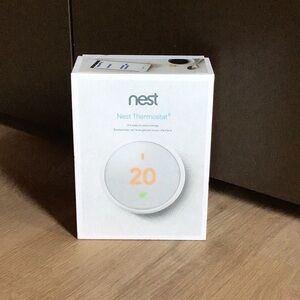 NEST Thermostat E - White with Orange Display